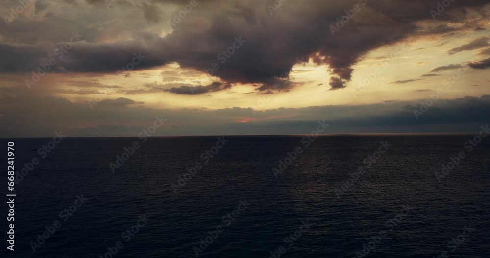 Nature sea sunset background.Tropical sea at sunset or sunrise over sea video 4K, The sun touches horizon, Red sky in golden hour amazing seascape,Ocean beach sunsets beautiful sky Nature sea sunset background.Tropical sea at sunset or sunrise over sea video 4K, The sun touches horizon, Red sky in golden hour amazing seascape,Ocean beach sunsets beautiful sky