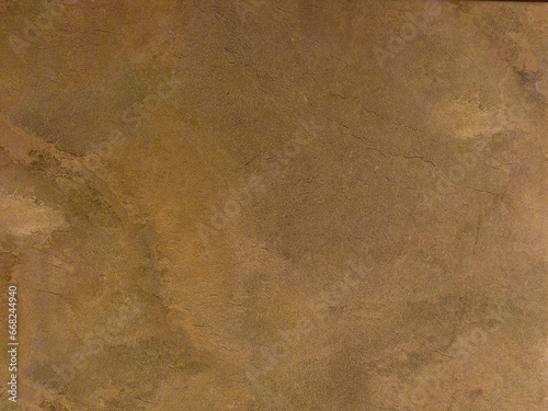 Yellow blurred surface. Yellow background with abstract pattern. Concrete floor.