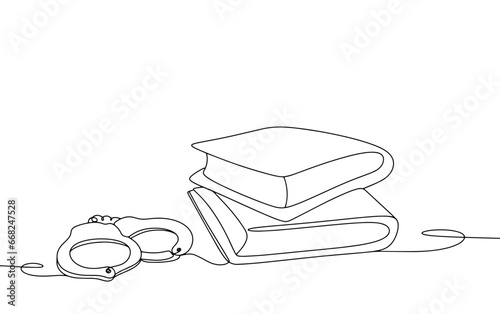 Handcuffs. Books. One line