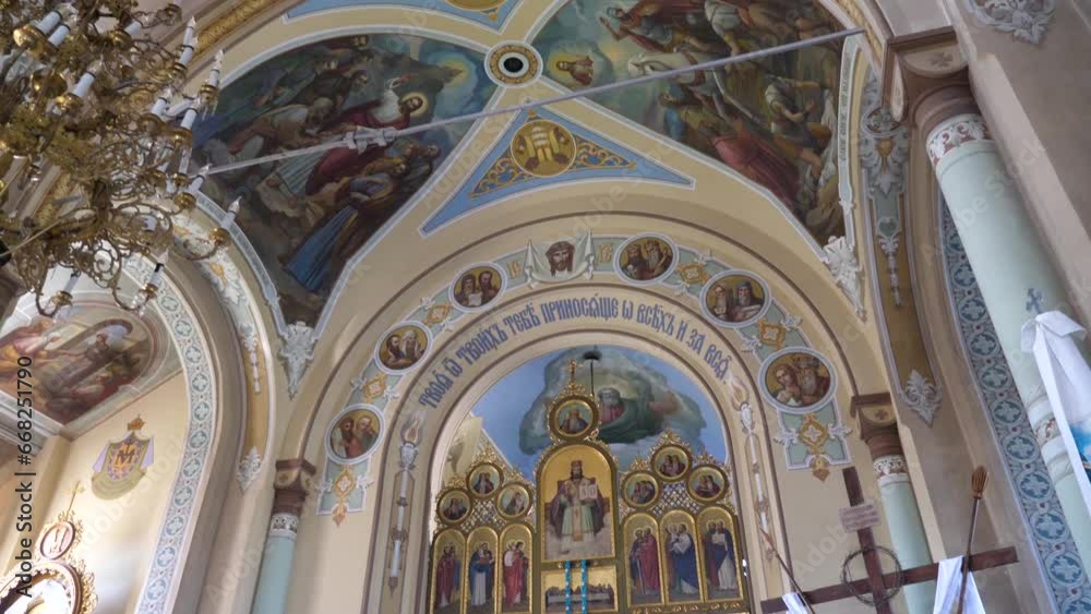 Interior, architecture of the Orthodox church with painting, iconostasis and panikadylo. Interior, architecture of the Orthodox church with painting, iconostasis and panikadylo.