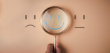 Smile face emotion happy inside magnifier glass show satisfaction happiness, excellent concept. And sad and normal mood oxytocin rating best feeling assessment.