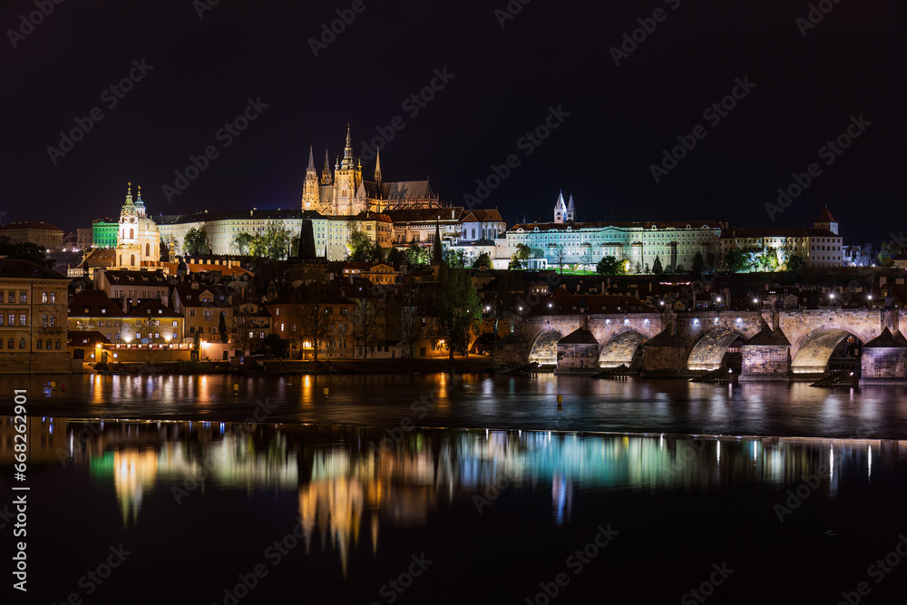 Illuminated night view of the charles bridge and Hradcin castle in Prague, Czech Republic