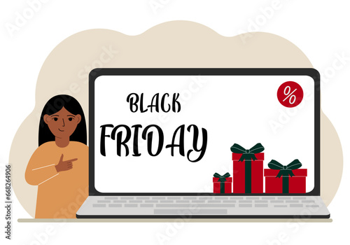 A little girl next to a big laptop, on his screen is the text black friday and a lot of gift boxes.