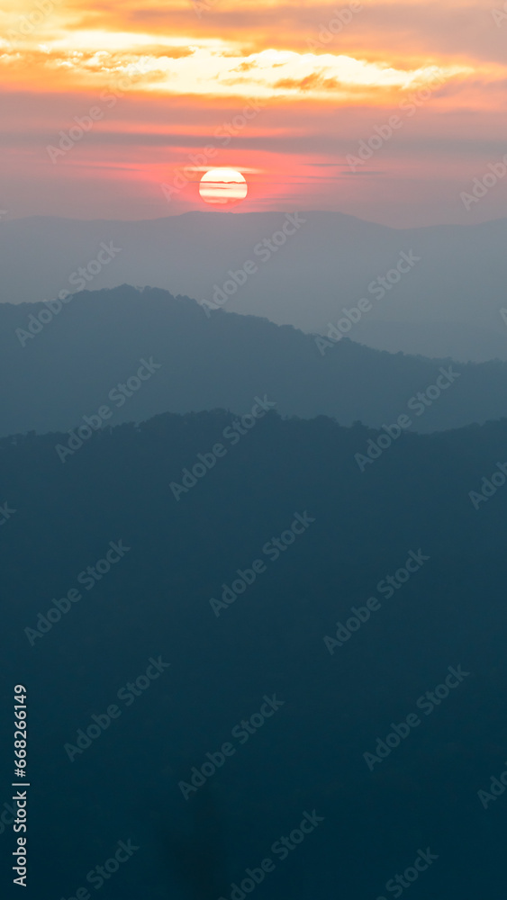 Colorful sunset on top of Thailand mountain