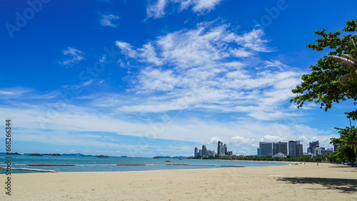 Pattaya beach, Pattaya city, Thailand. Pattaya beach is the best point and popular tourists to visit rest relax play sport swimming and riding journey boat vessel in sea in Chonburi.