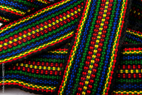 A traditional Ukrainian belt woven from woolen threads.