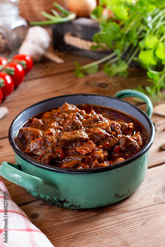 Goulash traditional Hungarian Beef Meat Stew or Soup with vegetables and tomato sauce