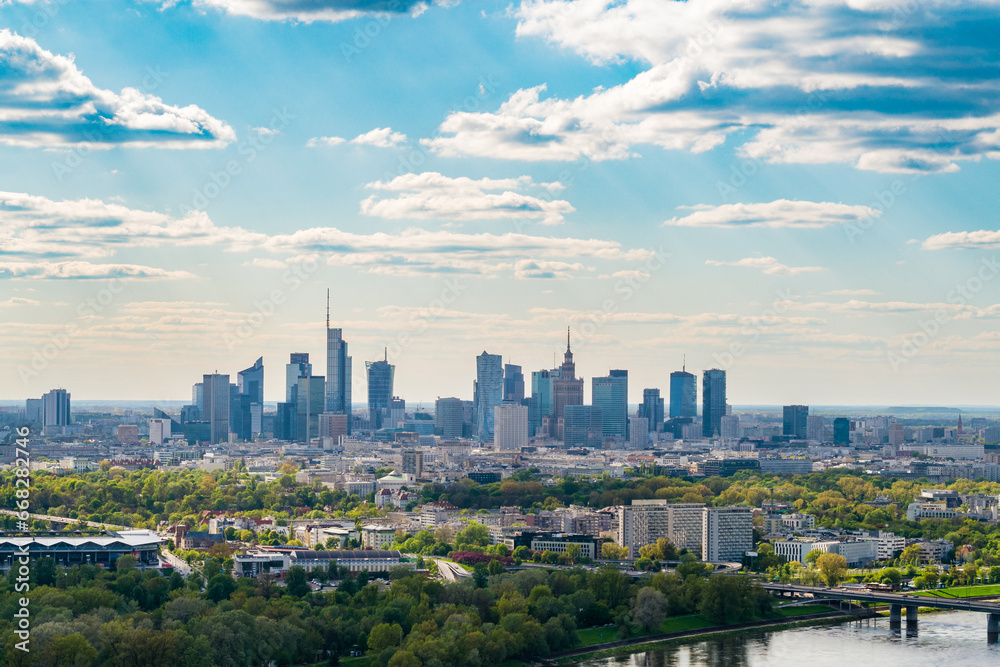 Skyscrapers in city center, Warsaw aerial landscape under blue sky - obrazy, fototapety, plakaty 