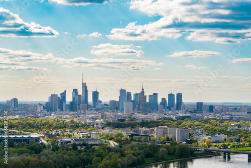 Skyscrapers in city center, Warsaw aerial landscape under blue sky © lukszczepanski