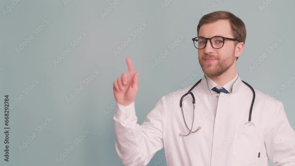 Doctor in white medical uniform showing hand gesture in studio Doctor in white medical uniform showing hand gesture in studio