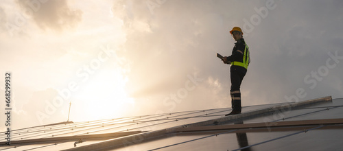 Techniques checking solar cell on the roof for maintenance. Service engineer worker install solar panel. Clean energy concept..