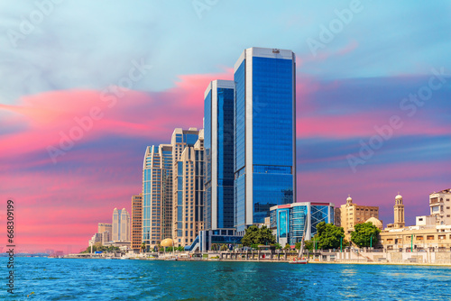 Obraz na płótnie Skyscrapers of Cairo by the Nile river, great sunset view of the capital of Egypt w salonie