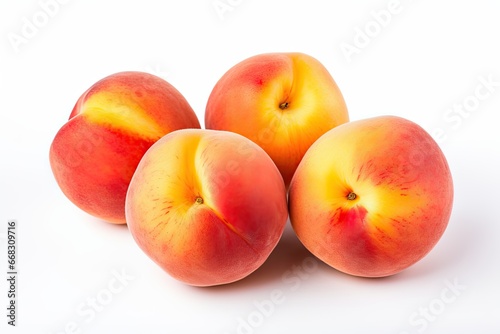 Ripe peaches, a trio of juicy and sweet fruits with velvety skin, displayed against a white background.