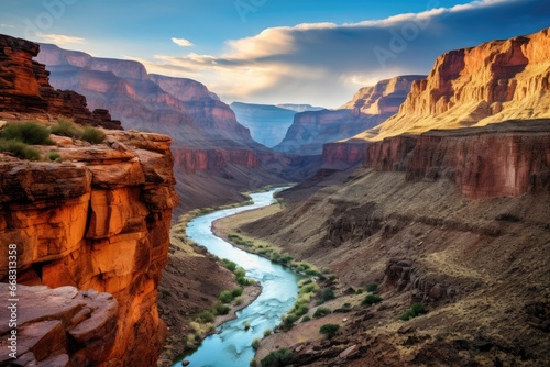 Majestic canyon with a river flowing below.