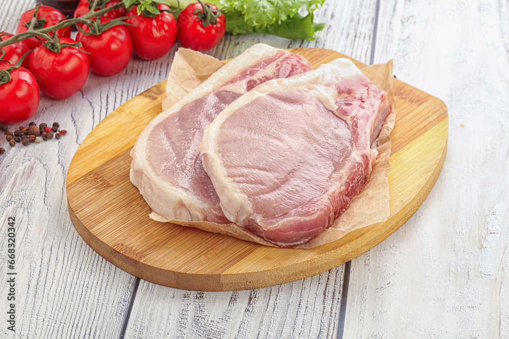 Raw pork t-bone steak for grill