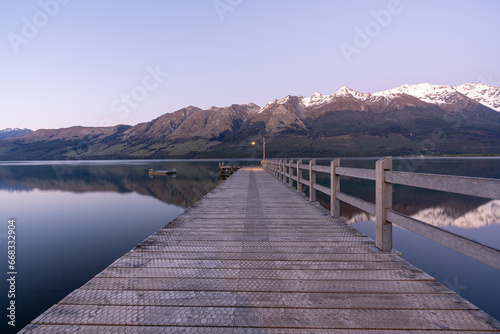 New Zealand landscape in Glenorchy near Queenstown with mountains and lake at sunrise