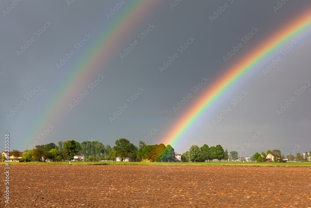 Double rainbow on a beautiful hills scenery in Italy Double rainbow on a beautiful hills scenery in Italy