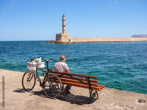 Schilderij op canvas Le pêcheur de La Canée Chania