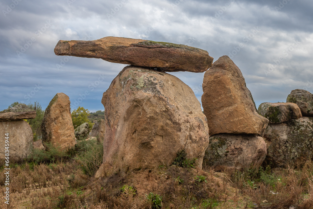 Modern Menhir exposure done near Castelo Branco in Portugal in a very cloudy day. With the menhir we began our path as designers and builders of landscapes.