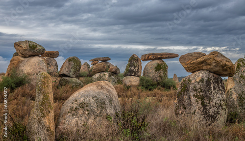 Modern Menhir exposure done near Castelo Branco in Portugal in a very cloudy day. With the menhir we began our path as designers and builders of landscapes.
