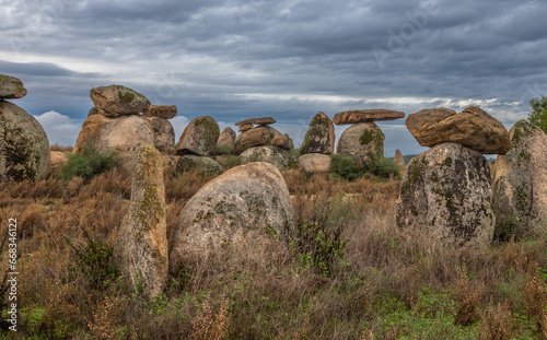 Modern Menhir exposure done near Castelo Branco in Portugal in a very cloudy day. With the menhir we began our path as designers and builders of landscapes. © Paulo