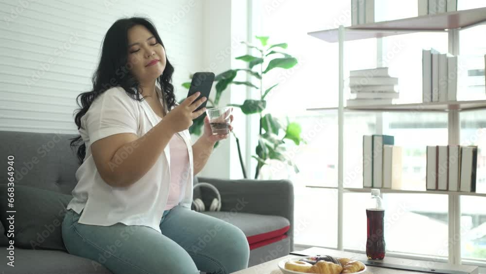 Plus size woman is eating junk food. Health care and lifestyle concept. Plus size woman is eating junk food. Health care and lifestyle concept.