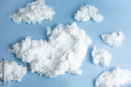 background texture of cotton wool clouds on a blue background for a newborn photo shoot