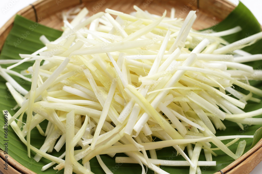White garlic chives in bamboo weave plate White garlic chives in bamboo weave plate