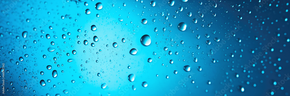 Drops of Water on Blue Background Banner