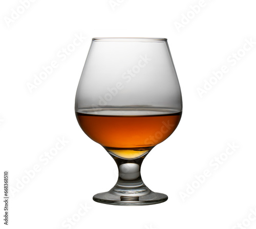 A brandy glass, containing brandy, isolated on a white background.