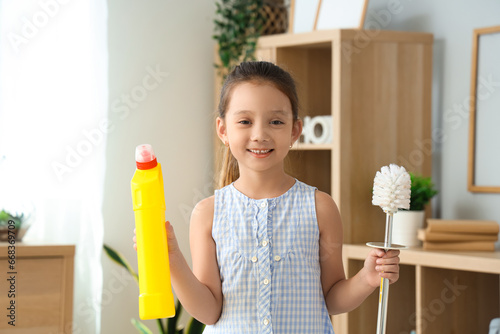 Cute little girl with toile...