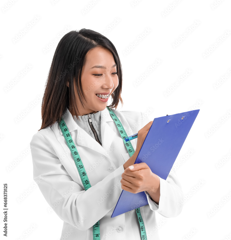 Female Asian nutritionist with clipboard on white background Female Asian nutritionist with clipboard on white background