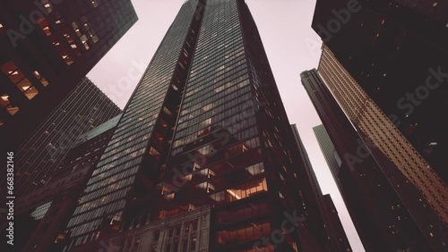 View looking up at high rise buildings photo