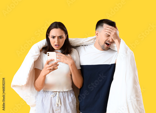 Shocked couple reacting to ...