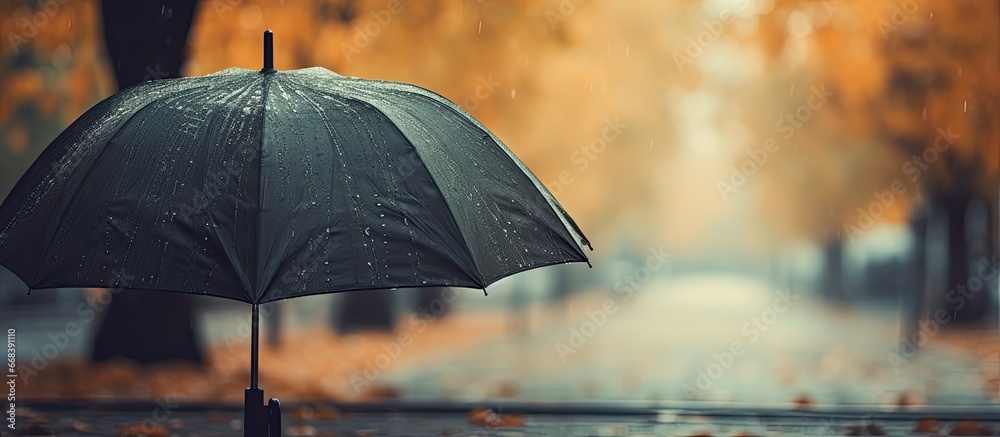 Vintage toned umbrella in the rain