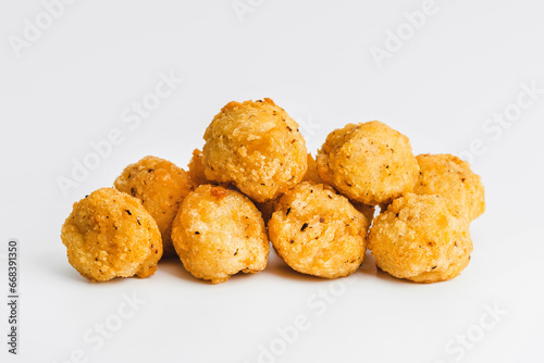 Chicken Breaded Fillet.Fast food. Breaded Chicken Inner Fillet on a White Background,Chicken Breaded Raw Meat. Fast cooking. Breaded chicken nuggets. Homemade food at home.