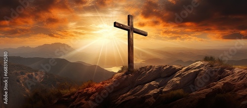 Fényképezés The stunning mountain sunrise and Easter Cross create a powerful Easter photo sy