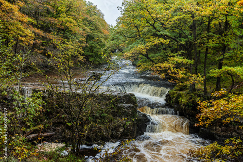 Sgwd y Bedol, meaning 'horseshoe falls', is a series of three waterfalls in quick succession on the Nedd Fechan.