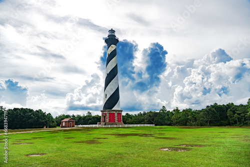 Cape Hatteras Lighthouse on the Atlantic Ocean in North Carolina. Against the backdrop of tragic clouds. photo