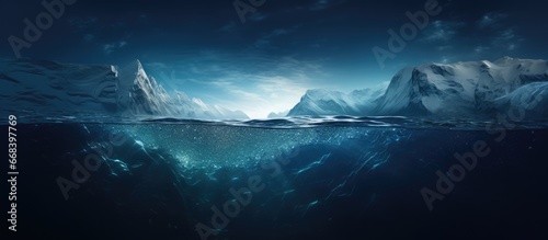 Nighttime view of an iceberg representing global warming melting glaciers and danger