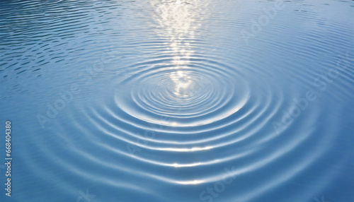 water blue ripples with sunlight top view background circle wave pattern water well free space display product transparent blue clear water surface texture with ripples splashes abstract summer