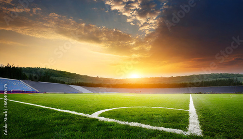 soccer field with grass and sunset