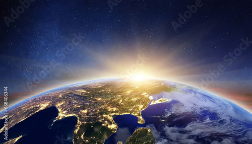 panoramic view on planet earth globe from space with rising sun glowing city lights light clouds generative ai