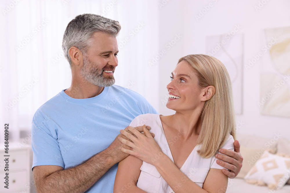 Portrait of happy affectionate couple at home. Romantic date Portrait of happy affectionate couple at home. Romantic date