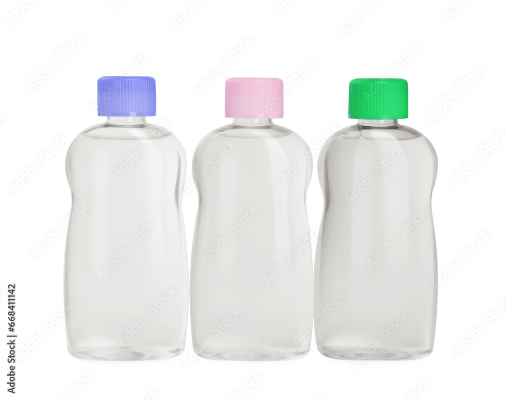 Transparent bottles with baby oil isolated on white Transparent bottles with baby oil isolated on white