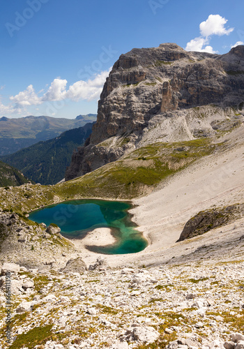 crystal-clear Laghi dei Piani at Dolomite Mountains in summer day.