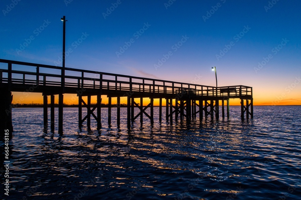 Pier at sunset on Mobile bay