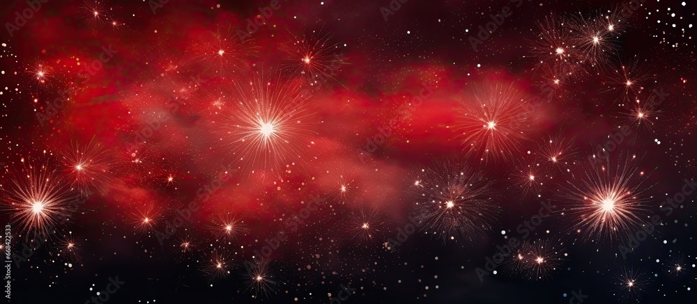 Nighttime display of red fireworks