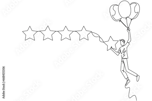 Fototapeta Naklejka Na Ścianę i Meble -  Single one line drawing young happy man flying in a balloon carries 1 star and wants to align it with the other 4 stars. Trying to give a perfect rating. Continuous line design graphic illustration