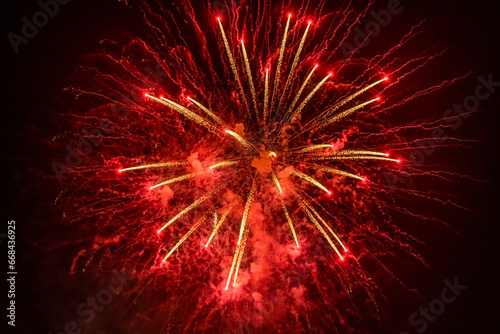 Beautiful red festive fireworks. Selective focus.